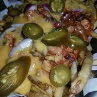 Vegan Cheese, housemade chili, jalapenos at Mid City Grill in Johnson City