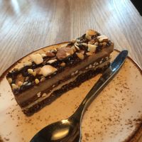 Snickers cake - only wish the portion size was bigger!!! at Funky Fresh Cafe - DogA in Oslo