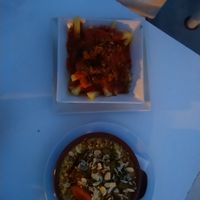 Patatas bravas y cous cous at Nazarí in Benaocaz