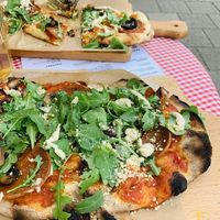 Truffle Pecorino pizza (again half eaten)😋 at Trevi's in Amsterdam