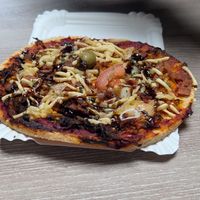 Pizza with a manioc flour base at VG Délices in Baie-mahault