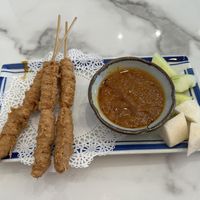 Satay chicken appetizer- soy based chicken served with peanut saucee  at Mamak Vegan Kitchen in Chamblee