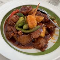 Mamak chicken entree- sweet and mild spicy deep-fried vegan chicken, bell peppers, and pineapple. Served with a side of white rice (not pictured).   at Mamak Vegan Kitchen in Chamblee