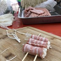 Staff preparing faux meat skewers for BBQ in the evening  at Míng Xiāng Yuán 名湘園蔬食燒烤 in Tainan