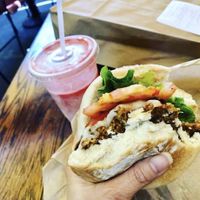 Mushroom burger with the Swiss cheese and a strawberry shake. What a perfect meal! 😋 at Evolution Fast Food in San Diego