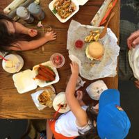 this NYC vegan family living this patio vibe and epic San Diego food!  at Evolution Fast Food in San Diego