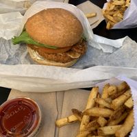 Pesto “chicken” burger n fries  at Evolution Fast Food in San Diego