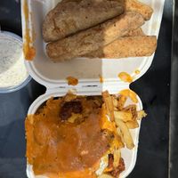 Chicken tenders and bacon cheese friess  at Evolution Fast Food in San Diego