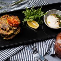Vegan Starter ZUCCHINI MEZZE FRITTERS at FACTORY GIRL Restaurant in Berlin