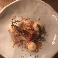 Fifth course: Gratinated tofu with onion in three ways (sweet and sour, cream and crispy), peanut cream and sambal gel. at Kale & de Bril in Goes