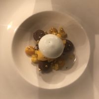 Sixth course/ dessert: mango sorbet with mango in olive oil, mango cream, chocolate mousse,  gold nuggets and a foam of cardamom. at Kale & de Bril in Goes