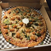 This is the Kawa pizza with no pineapples and I added spinach, green bell pepper & extra cheesee  at Veggie Planet in Vaughan