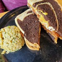 Reuben sandwich with chickpea salad side. at The Wild Cow in Nashville