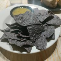 Corn chips and green salsa at The Wild Cow in Nashville