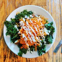 Buffalo Beans and Greens: buffalo tempeh, sautéed garlicy kale, pinto beans, brown rice, carrots, with vegan ranch. at The Wild Cow in Nashville