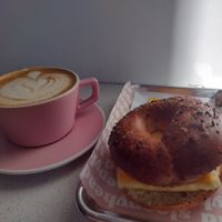 Sausage, egg, and cheese on everything bagel with salted caramel latte at Sleepyhead Coffee in Chattanooga