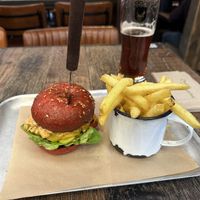 Beyond burger on beetroot brioche bun. Chips and 5AM Saint beer    at BrewDog - Soho in West London