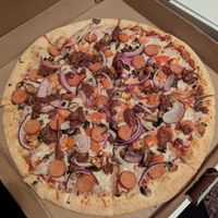 Philly Pizza with Beyond meat, red onions and sausages at Atlas Pizza in Montreal