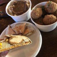 Potatoes and gravy, chicken, DFC Crunchwrap.   at Street Beet in Detroit