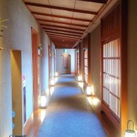 Japanese style corridor leading to the rooms. at Ryokan Ayunosato in Hitoyoshi