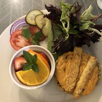 seitan cheese hemp burger with fruit  at Morning Glory Cafe in Flagstaff