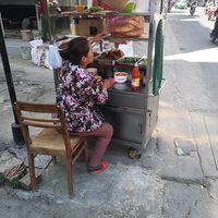 Lovely lady at Banh Mi Chay Co Hoa in Da Lat