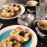Cappuccino and banana bread with agave syrup at Mother Vegan Bistro in Athens
