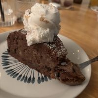 Chocolate cake with strawberry cheese cake-flavored ice cream   at Mother Vegan Bistro in Athens