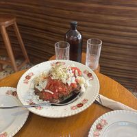 "Dakos" Cretan salad: carob rusks, tomato and cashew cheese at Mother Vegan Bistro in Athens