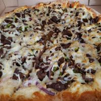 Philly cheese steak pizza at Cruzer Pizza in Los Angeles