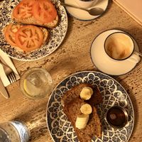 Iight breakfast of banana bread and tomato on sourdough  at Brew Coffee in Moy