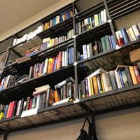 Books to read for free offered to the customers.  at Nuts Cafe in Naples