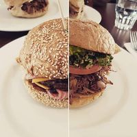 We split a double bacon cheese burger and a bbq jackfruit burger. at The Green Edge Cafe and Store in Windsor