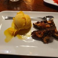 Brownie with mango sorbet at Peppes Pizza in Narvik