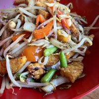 Crispy tempeh, green beans, paprika, and peanuts on rice  at Wok to Go in Utrecht