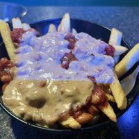 Chili queso fries  at Pizza Cave in Jacksonville