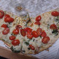American pan (12") with garlic butter sauce (vegan), vegan cheese, spinach, tomato at Upper Crust in Akron