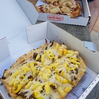 Detroit pan crust with vegan cheese, vegan steak, pineapple and banana peppers at Upper Crust in Akron