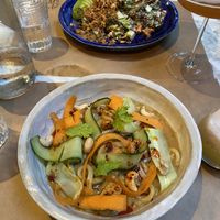 Curry noodles (front) and LA salad (back)  at Winners Vegan Restaurant in Athens