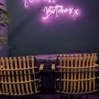 Required neon sign at Winners Vegan Restaurant in Athens