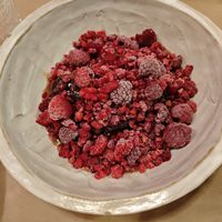 Brownie with berries at Winners Vegan Restaurant in Athens