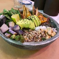 Satay protein bowl! Super heathy quinoa smoked tofu grilled greens no oil and many seeds and nuts!! Sauce made from home made peanut butter and coconut milk at Winners Vegan Restaurant in Athens