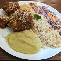 Barbecue cauliflower with mash, rice and salad at Pratada  in Sao Paulo
