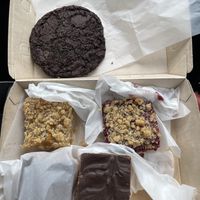 Mudslide Cookie, Peach Bar, Raspberry Bar, two Rice Krispie Bars. All vegan and absolutely delicious!  at Positively 3rd Street Bakery in Duluth