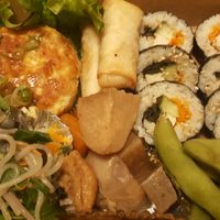 Dinner dish - Maki, nems, edamame, tofu steak and veggies at Itadakizen Paris in Paris