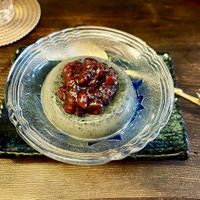 Matcha panna cotta with black sesame seeds, and topped with sweetened Azuki beans.  at Itadakizen Paris in Paris