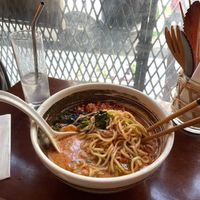 Ramen with spicy miso, a bite or two in, plus a lemon sour (it wasn't particularly sour). at Itadakizen Paris in Paris