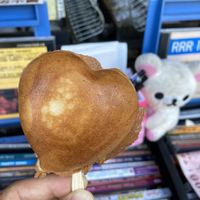 Original cake with free CDs in the background at Èrjiě Jīdàngāo 二姊雞蛋糕 in Tainan