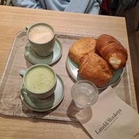 Pain au chocolat, croissant, matcha latte, regular latte at Land & Monkeys - Beaumarchais in Paris