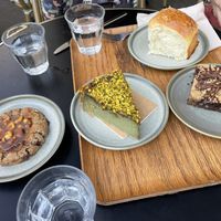 Monkey cookie, pistachio cake, chocolate cake and a plain sweet bread  at Land & Monkeys - Beaumarchais in Paris